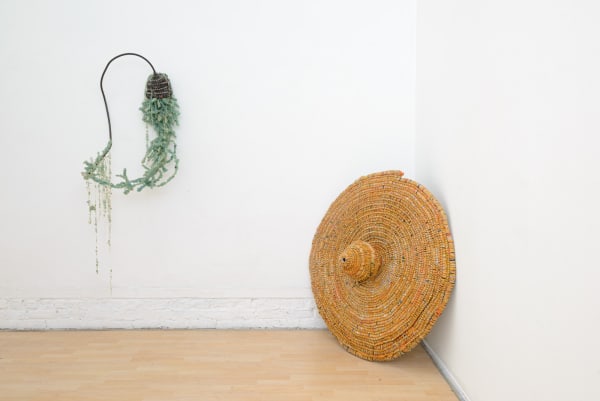 Installation view of Lucien Shapiro's solo show "Oculus", featuring found-object ritual sculptures