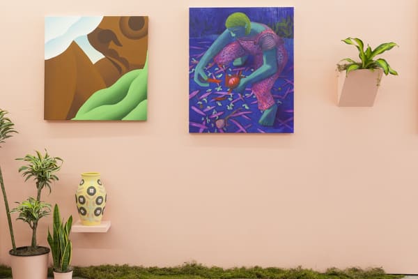 installation view of Lush 2022, gallery with peach walls and floral / plant themed artwork