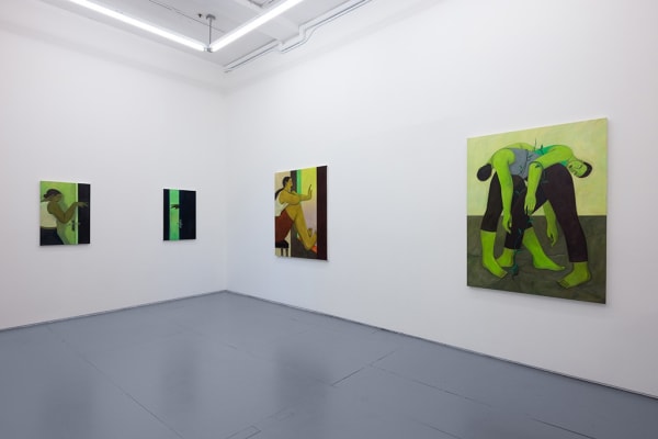 Installation photo of Hilda Palafox paintings of green women