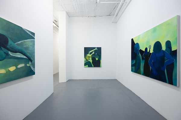 Installation image of blue and green Genevieve Cohn paintings