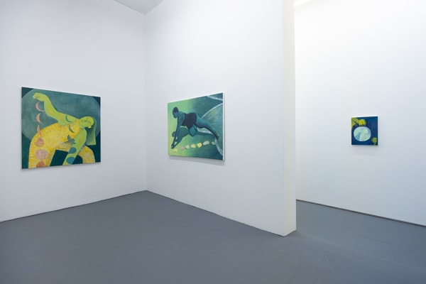 Installation image of blue and green Genevieve Cohn paintings