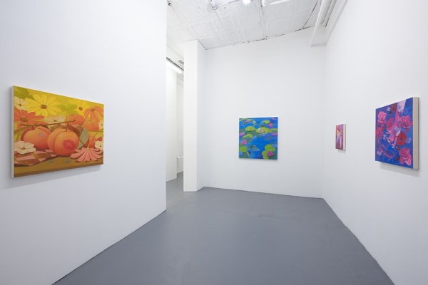 installation image of bright colored paintings by Megan Ellen Macdonald