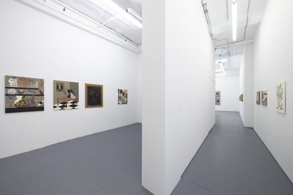 Installation image of collage like artworks from artist Madi