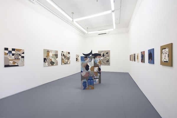 Installation image of collage like artworks from artist Madi