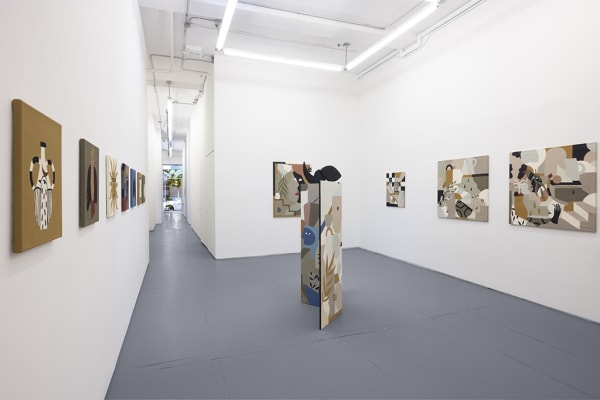 Installation image of collage like artworks from artist Madi