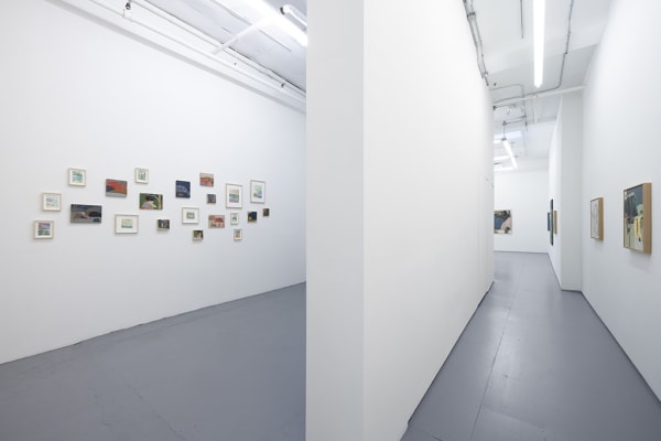 installation view of Seonna Hong artworks hung on white walls
