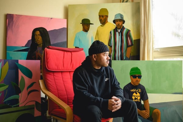 Photo of the artist Dennis Brown inside his studio.