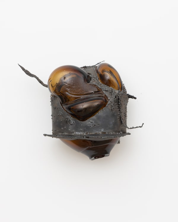Linnéa Gad (b. 1990) Glowpress, 2024 Welded metal with amber glass 9 1/2 x 9 x 6 1/2 inches 24 x 22 x 16 cm