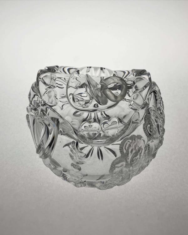 Katherine Vetne (b. 1987) Indulgence #14 (Baby Jar), 2021 Melted lead crystal jar with pacifier and teddy bear motifs 2 x 4 1/4 x 5 inches 5 x 10 x 12 cm KVE011