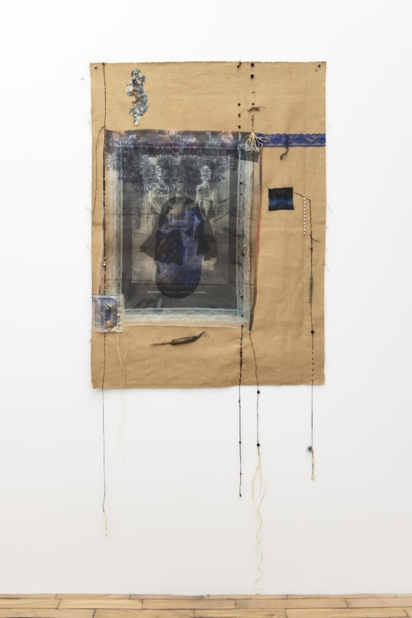 Adama Delphine Fawundu Radiance from the Waters, 2024 Archival inkjet print on silk habotai fabric, Charleston Gold Rice, hair fibers, Sierra Leone Heritage Seeds, lavender, handmade indigo fiber, St. Helena Island Okra, copper, silver, jute Overall: 82 x 35 inches 208 x 88 cm