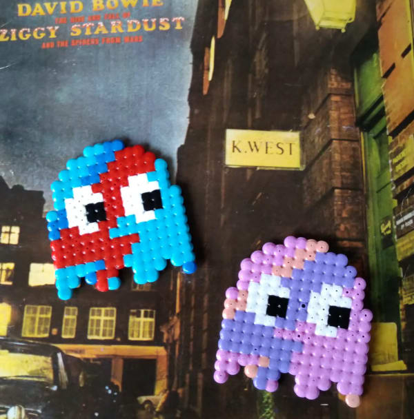 Charlotte Cowham, aged 13. Inspired by invaders artwork, aladdin sane.