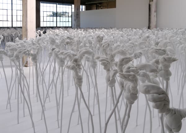Patricia Piccinini, "The Field," installation of 2000 PPE plastic flowers