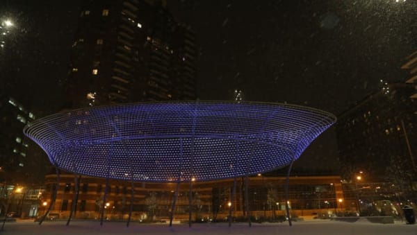 The Cowles Commons sculpture, Swirl, by artist Jim Campbell is illuminated on Tuesday, Jan. 19, 2016.