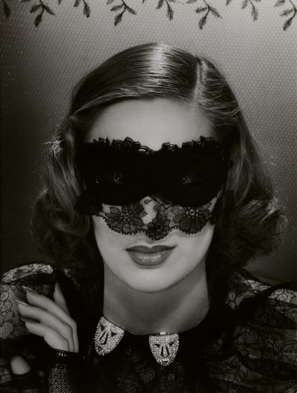 woman in black lace eye mask by Erwin Blumenfeld