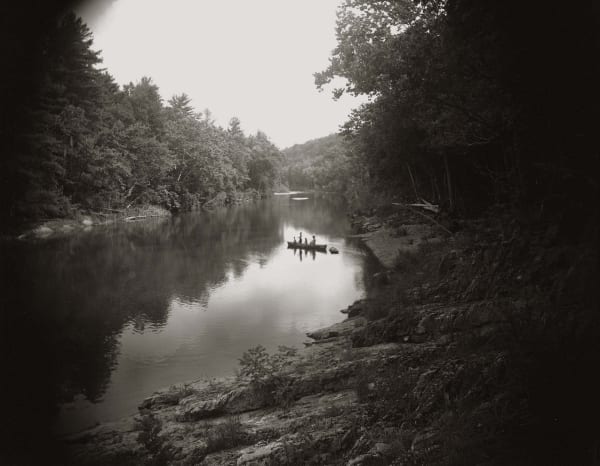 Emmett Jessie and Virginia in canoe crossing the Maury River from the Immediate Family series by Sally Mann
