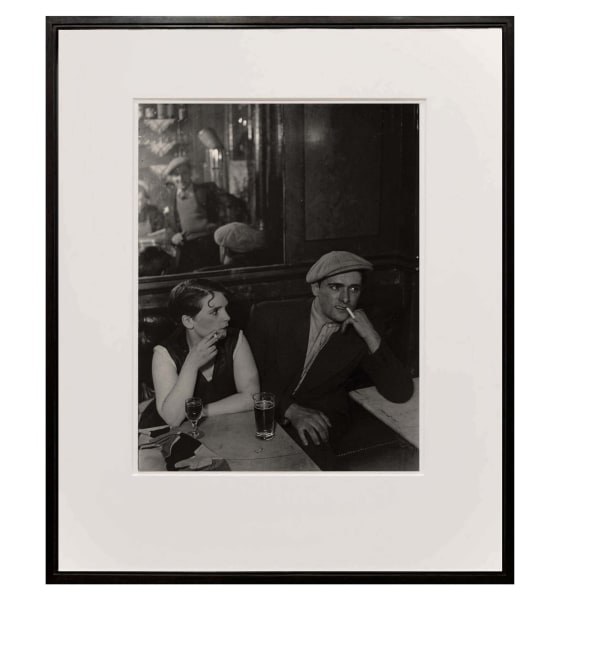 framed photograph of couple at a cafe at night from Paris de Nuit by Brassai