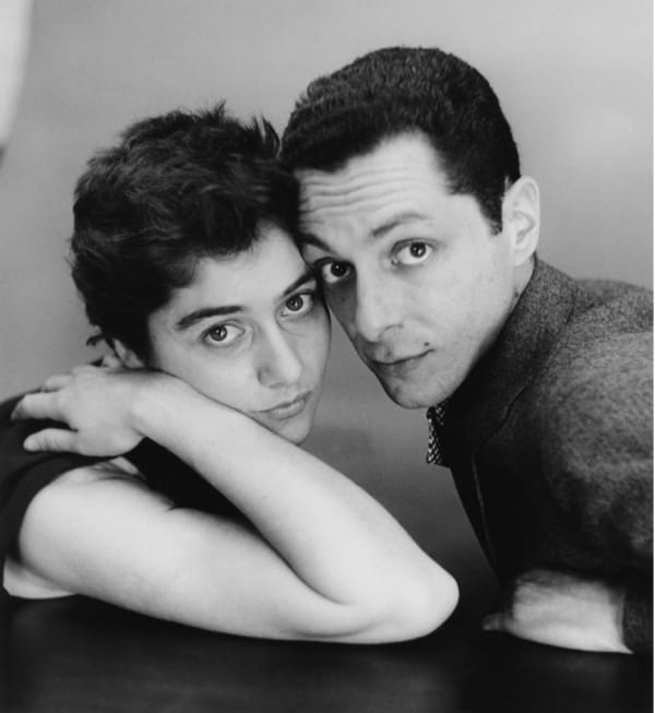 Diane and Allan Arbus posing for portrait heads touching in 1950