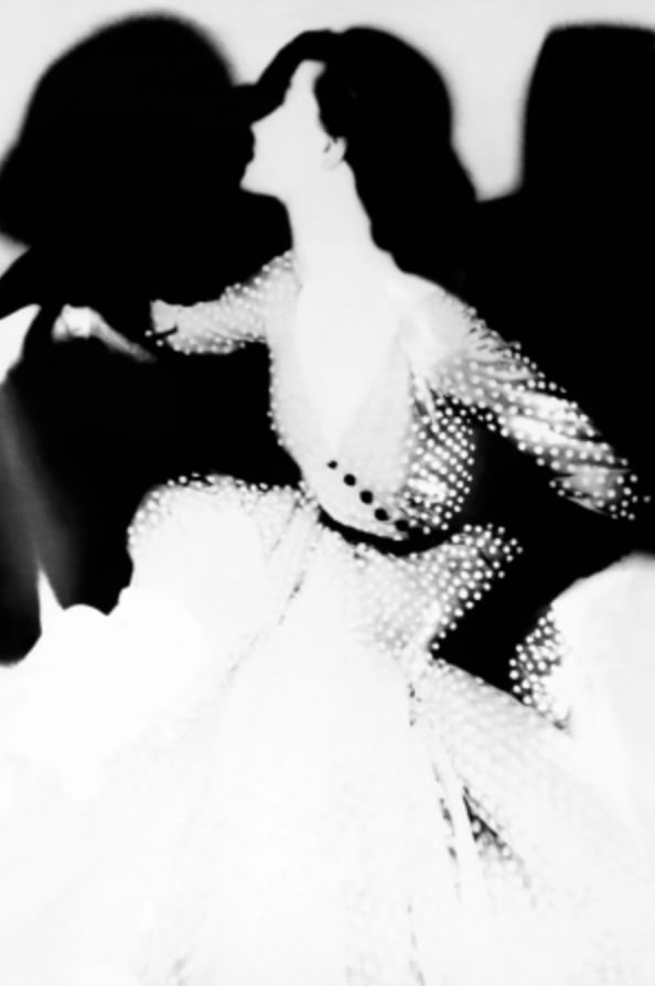 reinterpreted photograph of Barbara Mullen in vintage dress looking away from camera