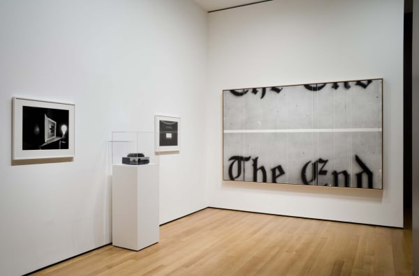 Installation view of Vik Muniz, Rebus at the Museum of Modern Art. Muniz chose to include Abelardo Morell's Lightbulb (1991) photograph, in the museum's permanent collection, in the exhibition. Photograph by Thomas Griesel.