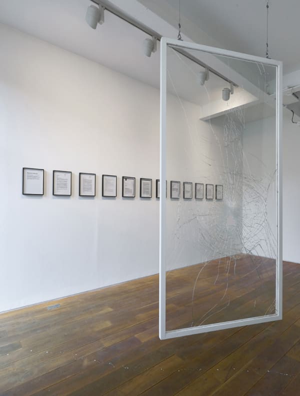 Brick 2009 broken window, scaffold pole, correspondence (12 parts), projection