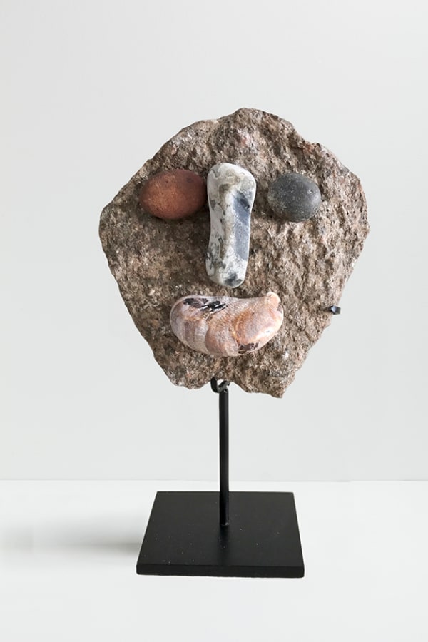 Peter Liversidge Effigy (4), 2017 Found stones and shell, hot glue and metal stand 14 x 12 x 5cm (excluding stand)