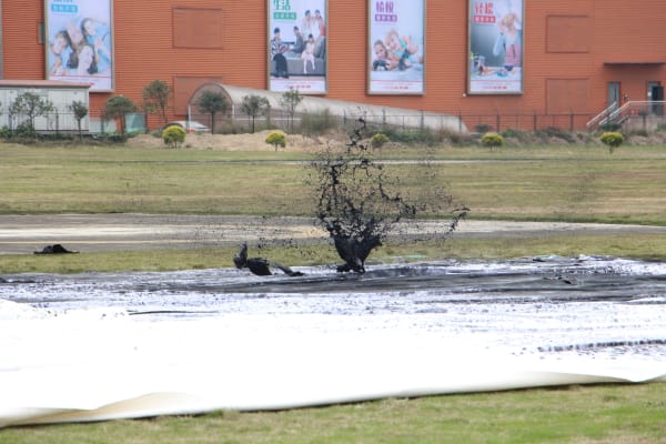 Bingyi, Epoché, 2014, canvas on ground receiving ink.