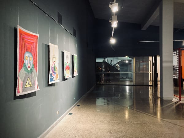 Installation view of embroideries by Paloma Castillo in Festival de la Primavera, main section at the I Biennial of Textile...
