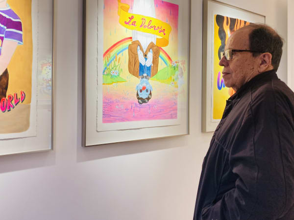 The father of the artist, contemplating the exhibition.