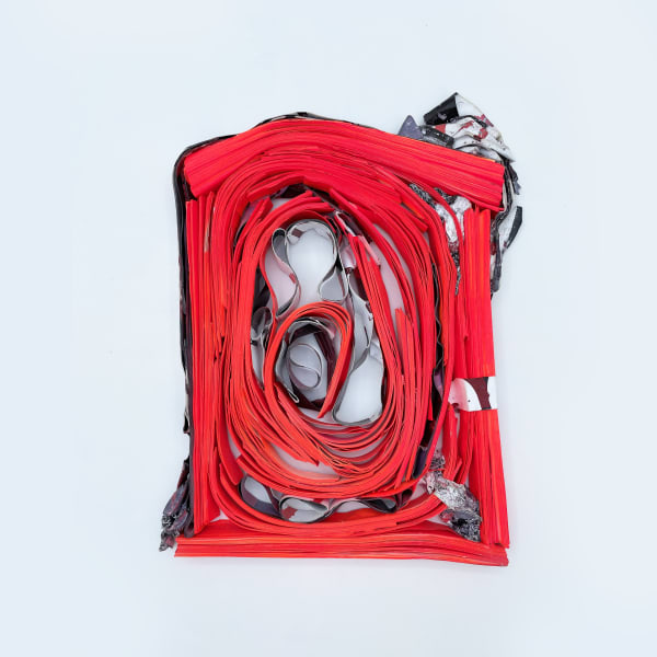 Ana Sanchez Pieza Roja, 2021 Recycled and modelled advertising poster paper. 54 x 44 cms