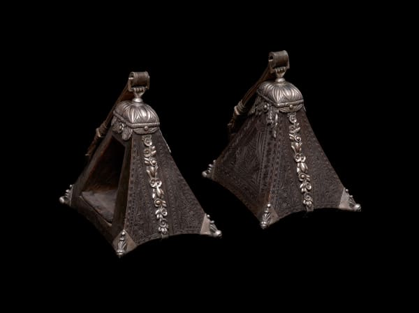 Pair of Box Stirrups Peru, early 19th century. Initials of former owner: J. CH Cast and chased silver, carved wood and leather. 25 x 26 x 17 cm