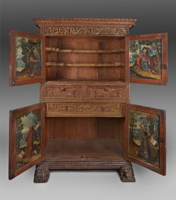 Armoire, 17th century Cuzco, Peru. Paintings: Diego Quispe Tito's workshop (San Sebastián del Cuzco, 1621 – 1687) Oil on wooden panel, gilt carved wood and iron fittings Height: 215 cm Depth: 94 cm Width closed: 147cm Width open: 236 cm
