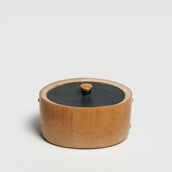 Andreas Caderas #023132 Bamboo container, 2025 Japanese bamboo, polished, clamps and lid top made of 9 grams of fine gold, pure silver interior, hand forged iron lid, underside of lid with silver frog, underside of the container made of patinated bronze. Cardboard box laminated with paper / cotton bag with silk inside with drawstring and 2 silver frogs. 6,2 x 11,5 x 9,3 cm