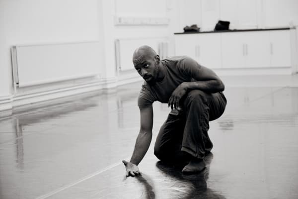Dickson Mbi in rehearsal. Photo Credit: Chris McAndrew.