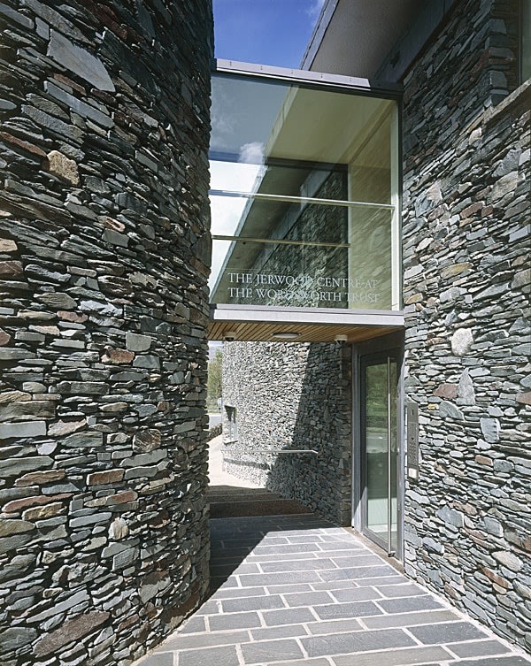 The Entrance to the Jerwood Centre, Wordsworth Trust, Grasmere. Photo: Charlotte Wood. "The Jerwood Centre will hold and hold good. Here and now it is impossible not to sense both its promise and staying power. As a work of architectural art, it represents what the poet W.H. Auden once called ‘The mass and majesty of this world. All / that carries weight and always weighs the same’; but it also represents the ongoingness of what W.B. Yeats called ‘the spiritual intellect’s great work'", Seamus Heaney, Poet Laureate (1939-2013), speaking at the official opening of the Jerwood Centre on 2 June 2005.