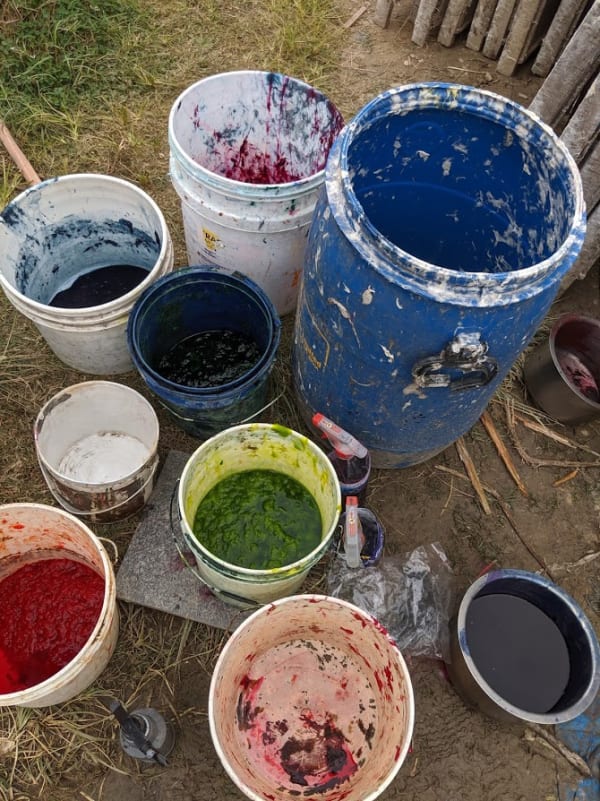 Buckets of dye for use during the paper making process, 2019