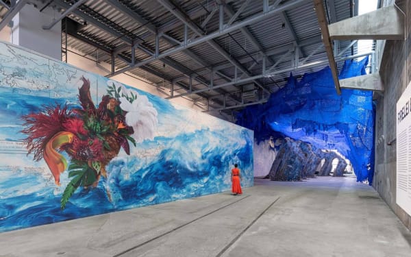 Installation view of Firelei Báez, ,To breathe full and free: a declaration, a re-visioning, a correction (19°36'16.9"N72°13'07.0"W, 42° 21'48.762" N 71°1'59.628" W, 36° 22' 0.1848'' N94° 12' 8.64'' W), 2021. Installation view, ICA Watershed, 2021. Courtesy of the artist and James Cohan, New York. Photo by Chuck Choi.