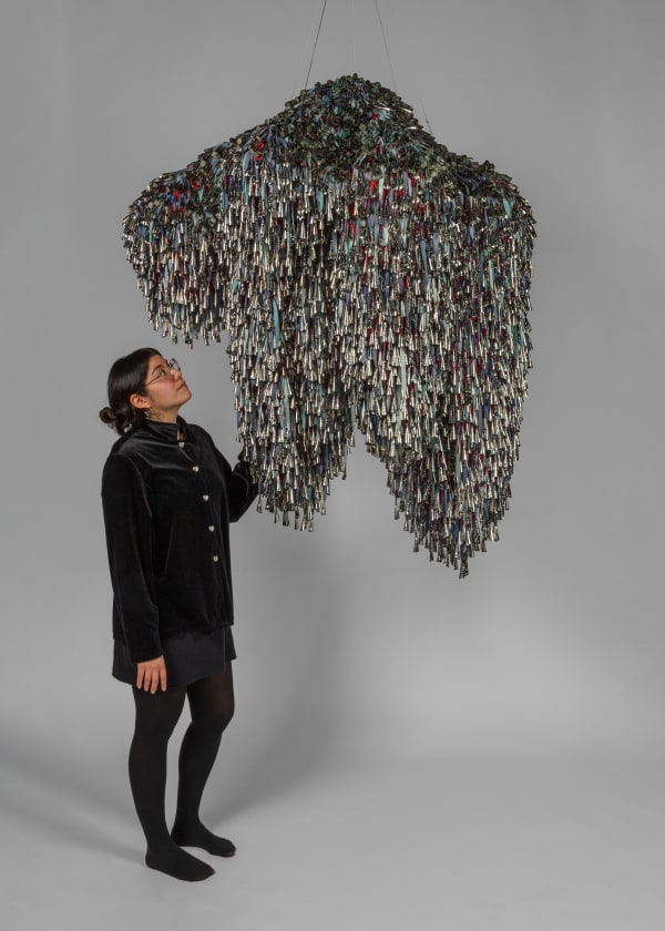 Marie Watt, Sky Dances Light Forest (2023). Tin jingles, cotton twill tape, polyester mesh, steel. Courtesy of the Artist and Kavi Gupta.