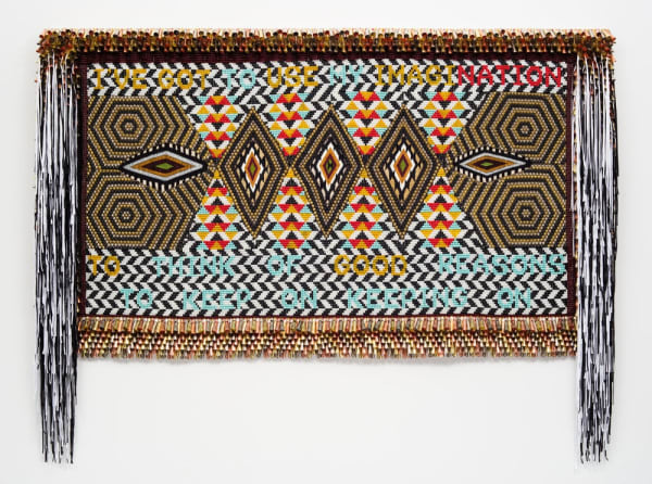 Jeffrey Gibson. “TO MY NATION” (2017). Glass beads, artificial sinew, trading post weaving, metal studs, copper and tin jingles, nylon fringe, acrylic felt, canvas, wood.70 x 91 INCHES.