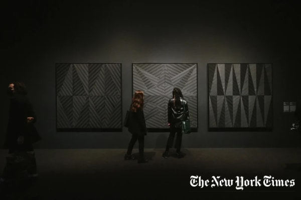 James Little’s sixth-floor installation, with “Exceptional Blacks,” “Stars and Stripes” and “Big Shot,” from 2021. Credit: Charlie Rubin for The New York Times