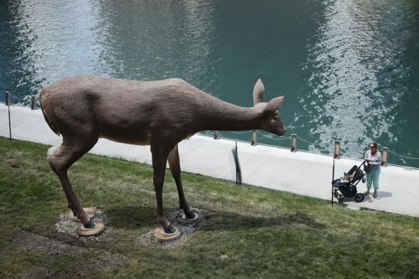 Deer by sculptor Tony Tasset has been installed along the newest section of the Chicago Riverwalk between Franklin and Lake streets. (E. Jason Wambsgans/Chicago Tribune)