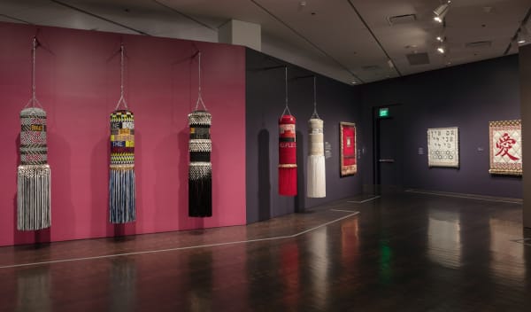 Adorned punching bags by Jeffrey Gibson, found and ready-made materials.Courtesy of the Denver Art Museum