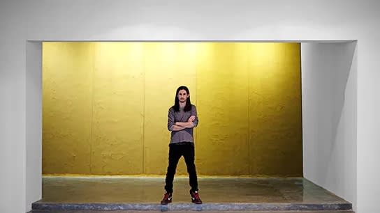 The artist standing in front of his work at West Hollywood’s Depart Foundation. Photo courtesy of Kour Pour