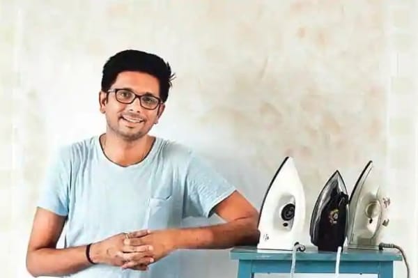 Manish Nai with his iron-pressed print. Photo: Dinesh Parab/Mint