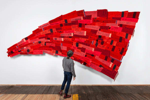 Marie Watt: Companion Species: Cosmos, Sunrise, Flint, 2021, reclaimed wool blankets, embroidery floss, thread, 115 by 220 inches.