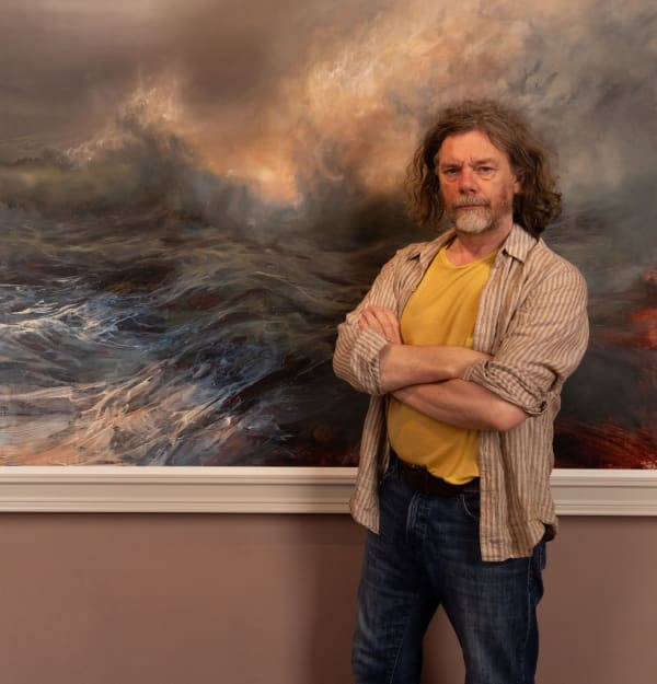 Tony with a large Beth Robertson Fiddes wave painting.