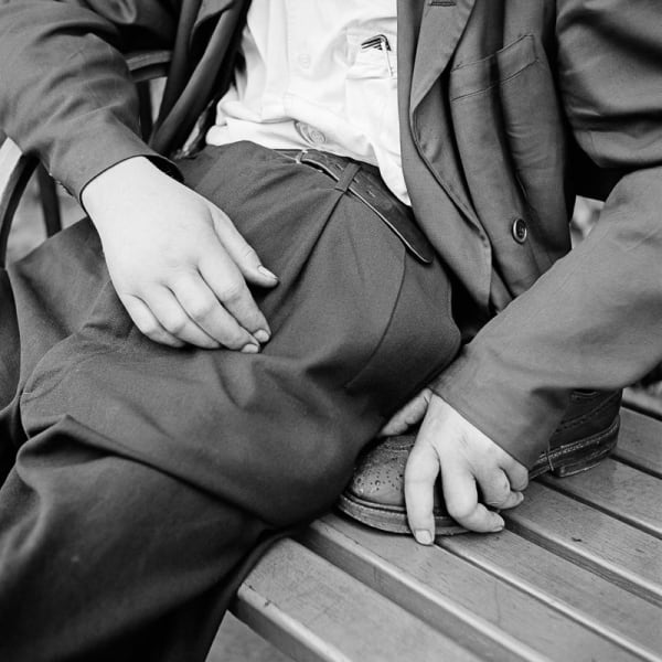 Vivian Maier, Man on Bench with Shoe