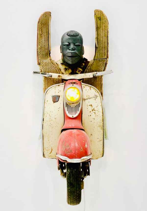 Zak Ové Hands Up, 2019 1960s Lambretta scooter, cast graphite, hand made glass African beads, LED lighting and electrical transformer. 140 x 60 x 70 cm 55 1/8 x 23 5/8 x 27 1/2 in