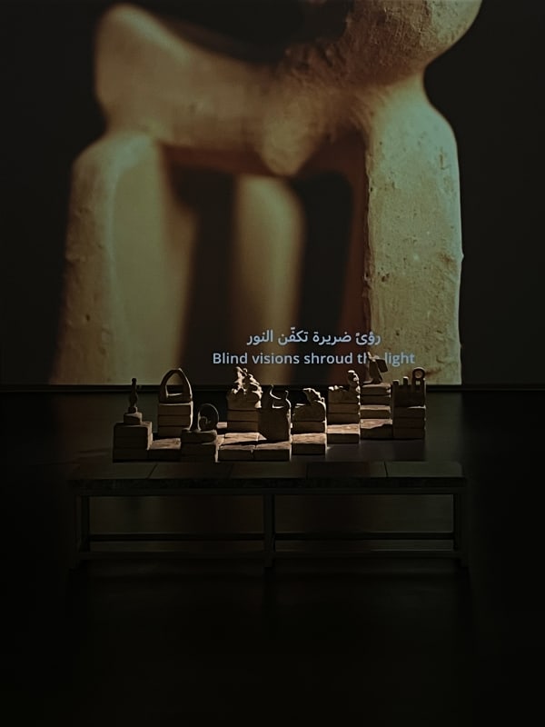 Rand Abdul Jabbar, May It Be Remembered, 2023 Single channel video (sound, 7 minutes), mud sculptures, dimensions variable. Courtesy of the artist.