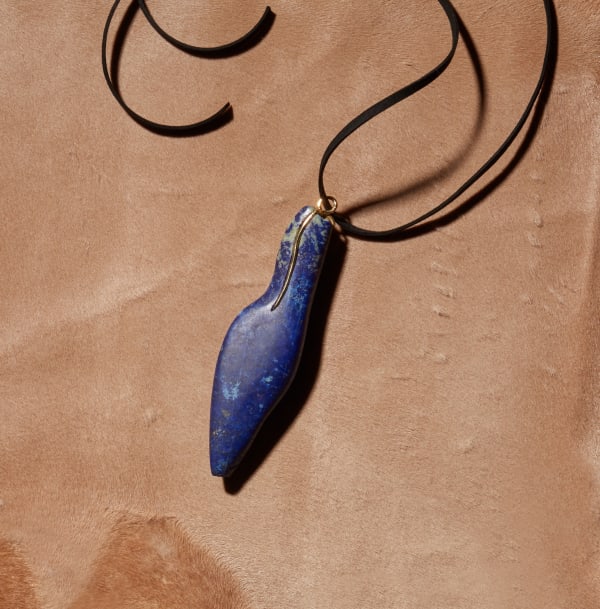 Emily Young, 'Little Lapis Goddess I' Pendant, 2016, lapis lazuli & 18k gold with marble stand. Stamped 'EY16', 'LG', no. 1 & hallmarked. Pendant: 14 x 4.0 x 0.5 cm. Unique piece in collaboration with Louisa Guinness.