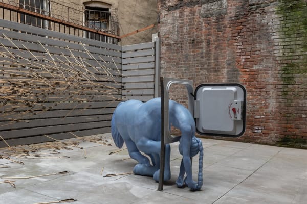 Catalina Ouyang, Recourse, 2021, Fiberglass, steel, school bus emergency hatch, arrows; dimensions variable